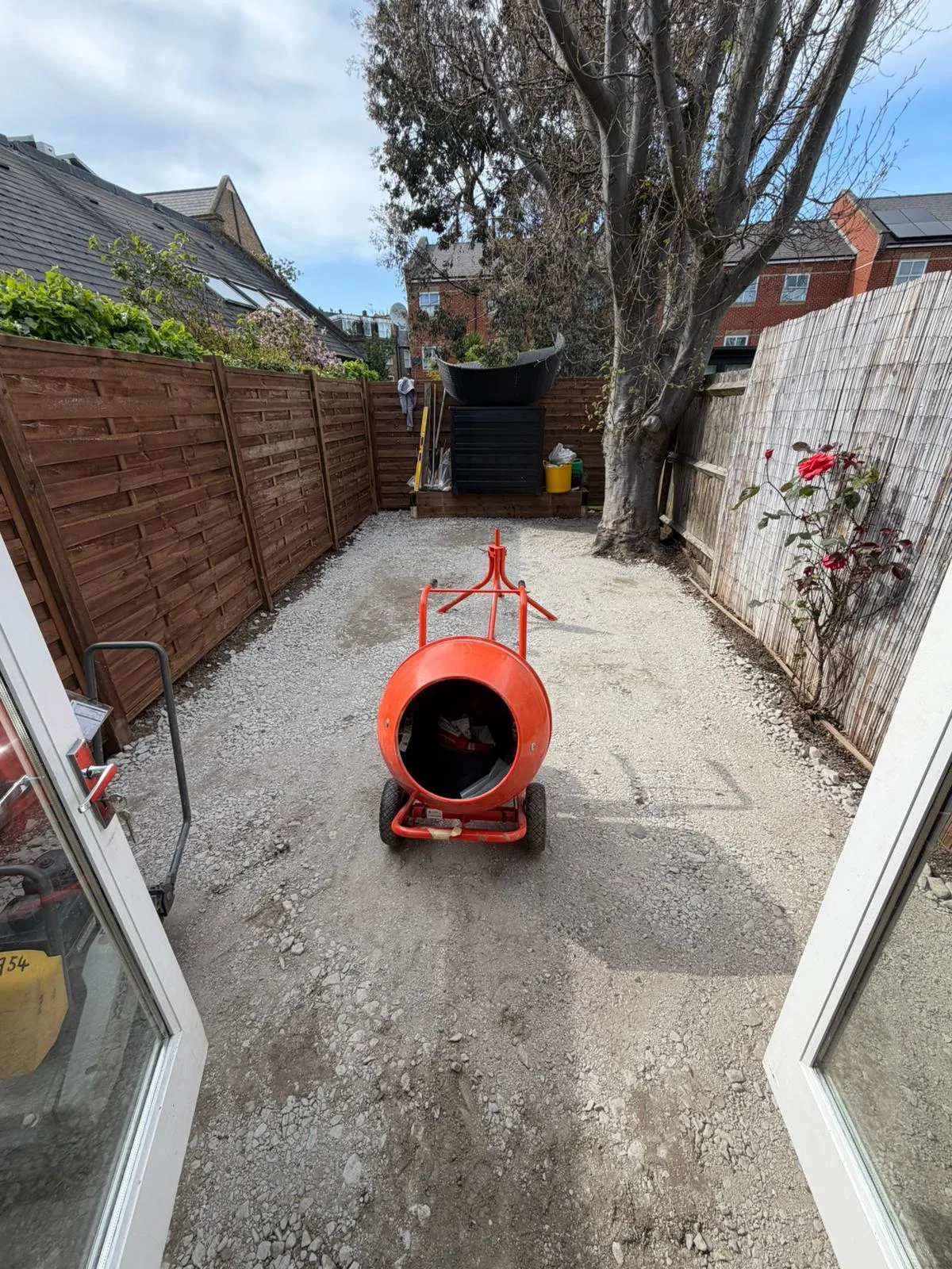 Cement mixer on site during garden preparation Battersea SW11