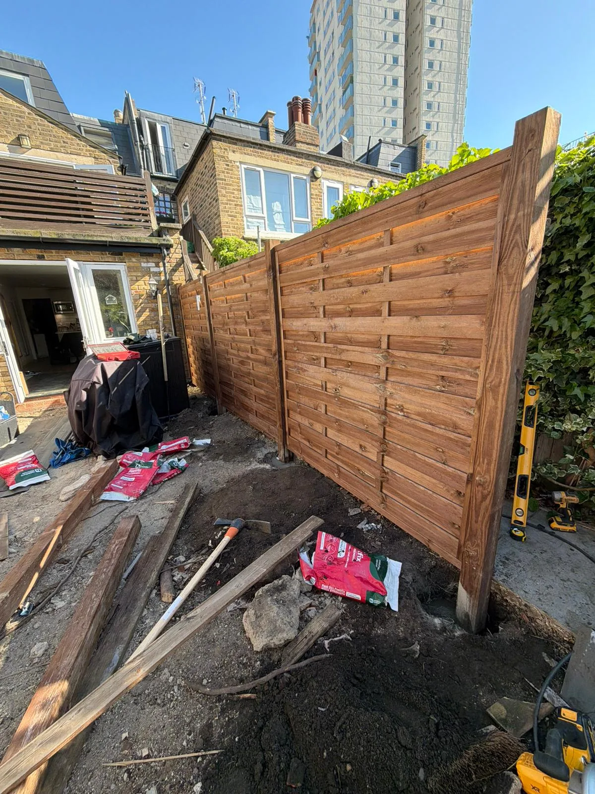 Battersea Premium Venetian fence panels installed showing precision horizontal batten spacing