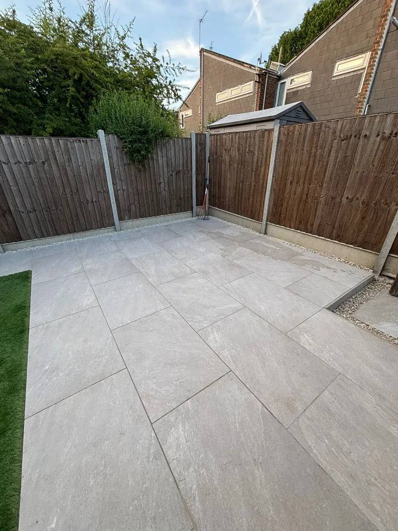 Porcelain patio installation by The Tree Amigos in a London garden